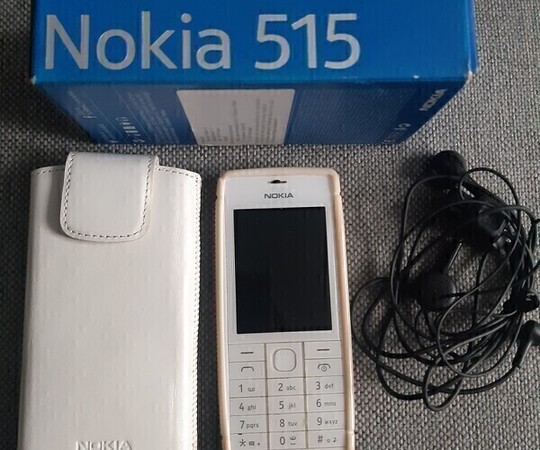 📱 Nokia 515 + ładowarka + słuchawki + 2 etui 