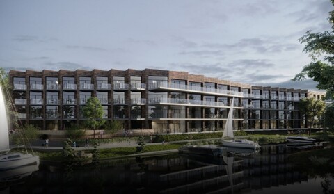 Apartamentowiec i hotel przy biurowcu nad rzeką?