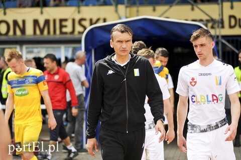 Olimpia z trenerem i pomocnikiem