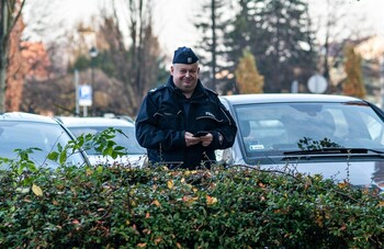 >Murem za sędzią Rutkiewiczem